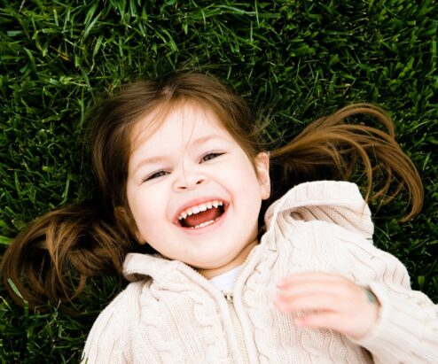 cute kid on the grass